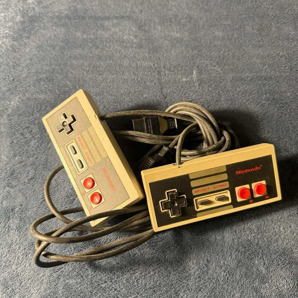 Pair of Original Nintendo Entertainment System (NES) Controllers, Model NES-004